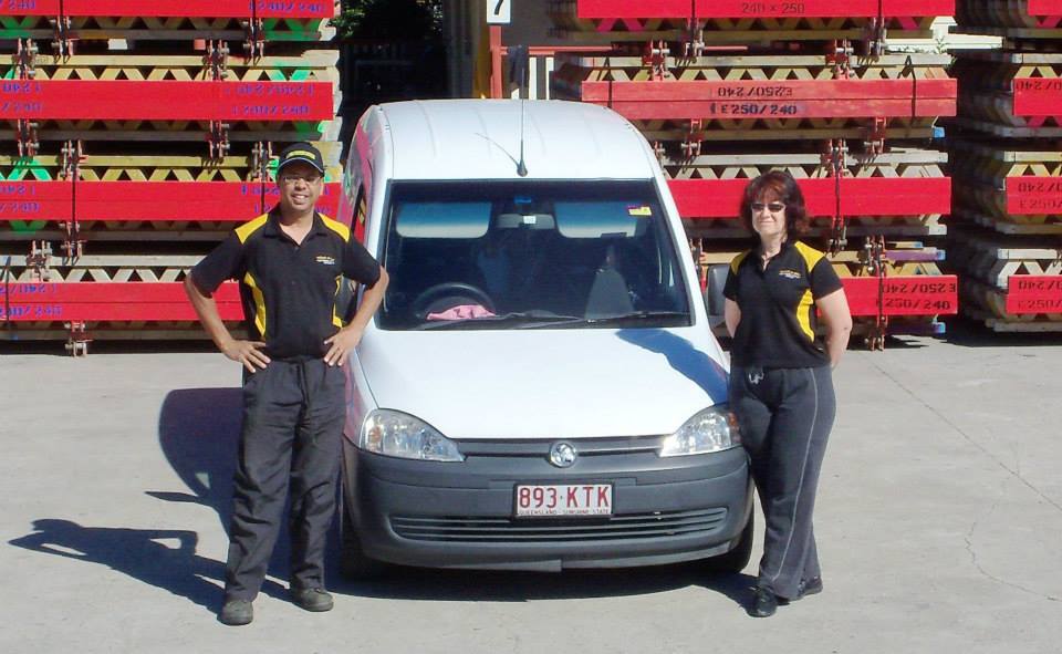 Reflect-A-Shine owner-operated cleaning team standing beside service van in Logan
